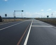 Почти 90 км федеральных дорог в Оренбуржье защитили слоями износа